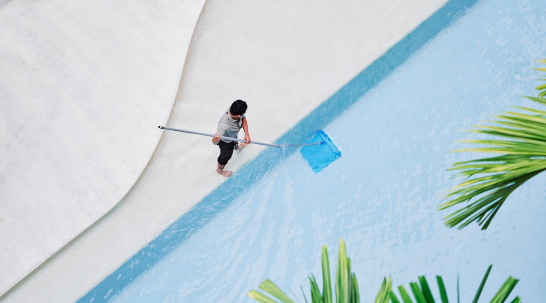 pool attendant taking care of a pool